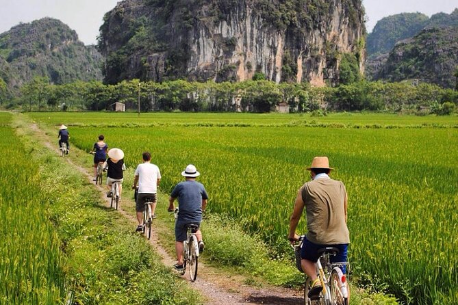 Ninh Binh 1 day trip with Hoa Lu- Tam Coc boat & Cycling village - What happens at Mua Caves