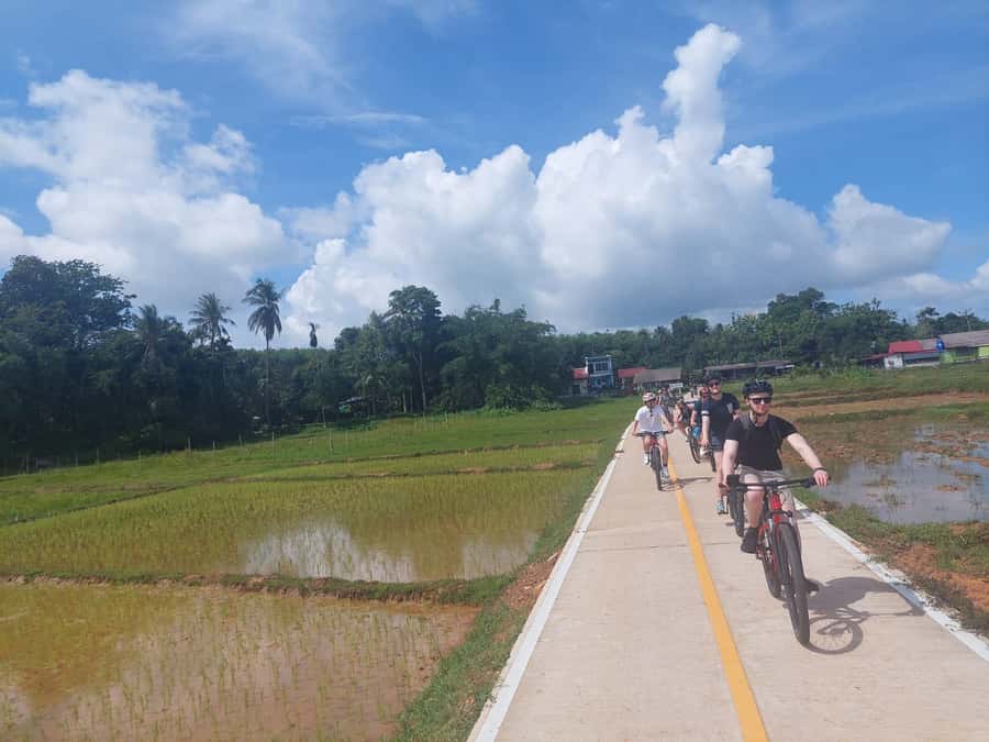 Phuket: Yao Island Cycling and Beach Day-Trip - Seeing a fishing village on stilts