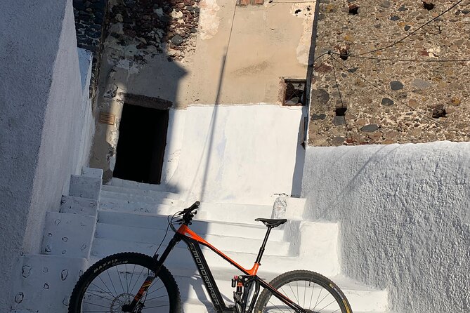Private Electric Mountain Bike Experience and Tour in Santorini - Eros Beach adds the most adventurous section