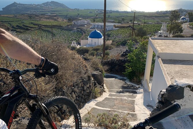 Private Electric Mountain Bike Experience and Tour in Santorini - Windmills deliver the wide view