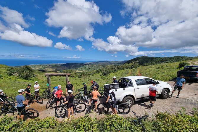 Private Mountain Biking Experience in the Wild South of Mauritius - Lagoon, mountain, and waterfall views