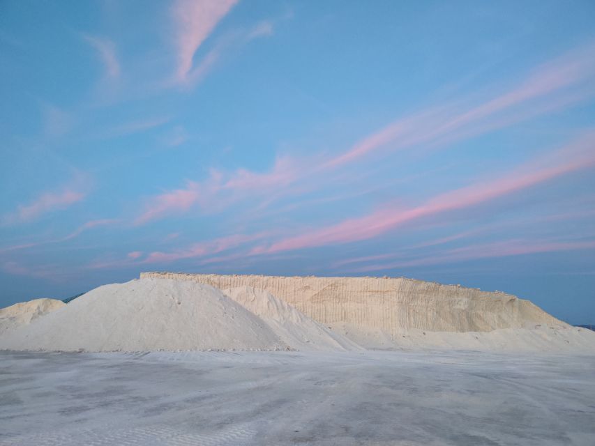 Sant'Antioco: Guided E-Bike Excursion at Sunset - White salt mountains and changing colors