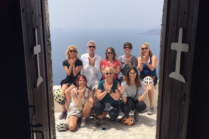 Santorini E-bike Adventures - The Original Bike Tours - Riding through Emporio and old village lanes