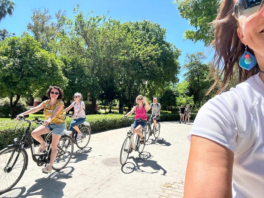 Seville: Dutch Cycling Highlights Tour with local guide - Triana and the character across the river