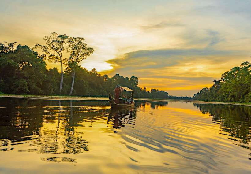Siem Reap: Angkor Sunset Bike & Boat Tour /E-Bike Available - Entering Angkor through park roads and forest trails