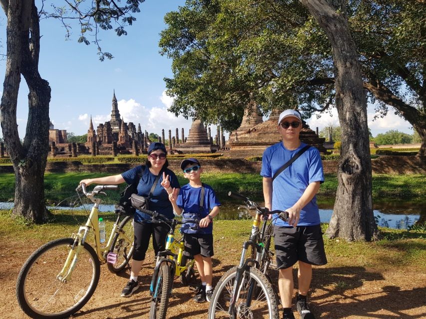 Sukhothai: Full-Day Historical Park Cycling Tour with Lunch - Entering Sukhothai Historical Park by bicycle