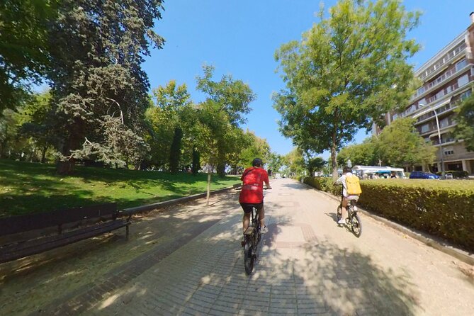 Sunset E-Bike Adventure: Green Madrid Tour - Casa de Campo Lake brings open space and water