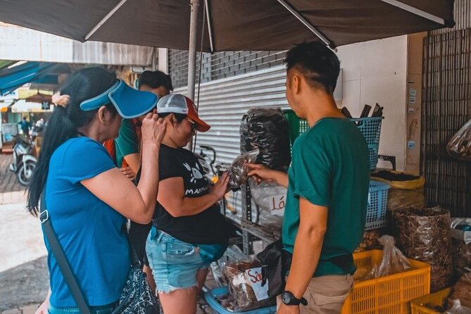 Trails of Chinatown’s Richest Man - Ho Chi Minh City Cycling Tour - Binh Tay Market, Quach Dam’s lasting mark