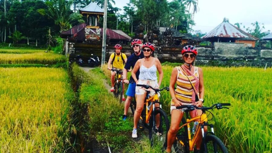 Ubud: Downhill Countryside Cycling From Kintamani - The village stop adds meaning to the ride