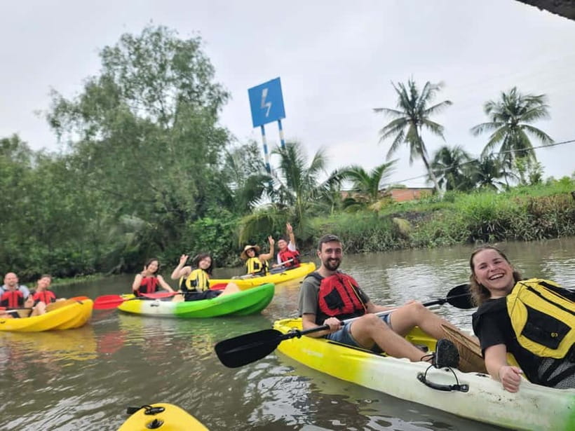 VIP Mekong Delta Full Day Adventure Cycling-Kayak-Cooking - A boat ride on the Tien River